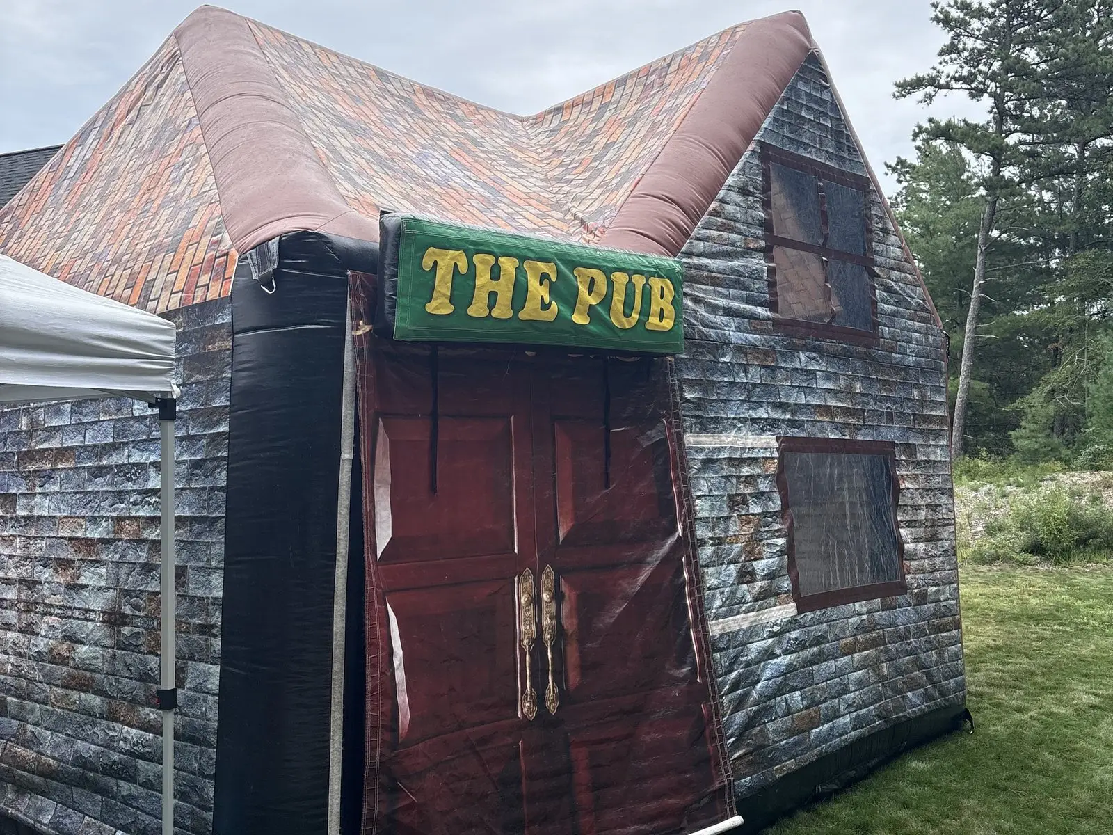 The Aer inflatable pub set up on a lawn for a party